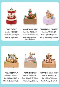 Detailed view of rotating wooden music box collection with classic 18-note movement
