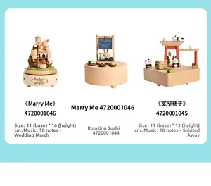 Three styles of handmade wooden music boxes featuring panda, rabbit and wedding themes