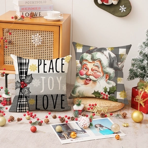 Set of two Christmas linen pillow covers with Peace Joy Love text and Santa Claus print