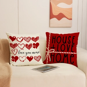 Linen Valentine's Day heart throw pillows set on sofa with Love You More print