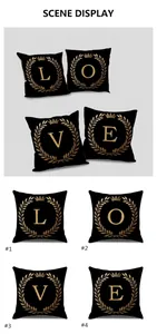 Detailed close-up of four black and gold linen pillow covers with LOVE letter prints