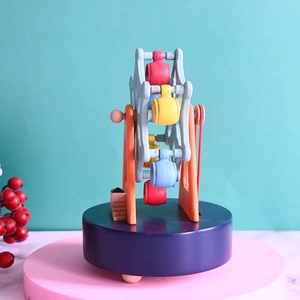 Mechanical wooden Ferris wheel music box with colorful painted baskets on blue base