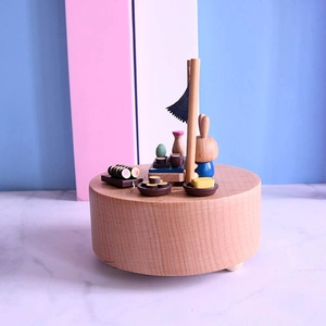 Handcrafted wooden rabbit music box with Japanese sushi scene in premium beech wood finish