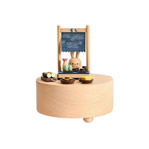 Japanese wooden music box featuring a rotating sushi shop scene with a rabbit chef