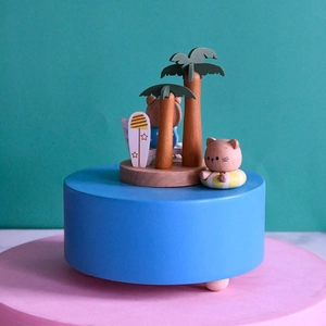 European painted wooden cat music box with summer beach theme and surfboard