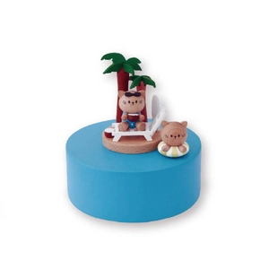 European wooden music box with island cat theme and palm trees on a blue base