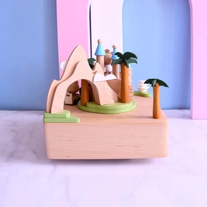 14cm wooden music box featuring a castle and mountain landscape with soft pastel accents