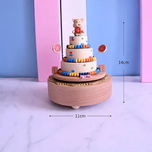Handcrafted wooden piggy birthday cake music box with rotating mechanical base