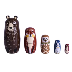 Hand-painted wooden animal nesting dolls set including brown bear fox and owl