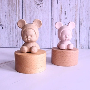 Cute sleeping baby wooden music box figurines with natural grain and pink matte finish