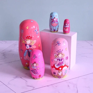 5-piece set of wooden Russian nesting dolls featuring pink fairy and princess designs