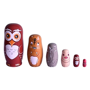 Set of 6 wooden animal nesting dolls featuring owl, tiger, and elephant designs
