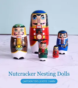 Detailed view of five handcrafted wooden nutcracker nesting dolls with vibrant painted finish