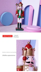 Detail of 30cm wooden nutcracker with red sequin uniform and hand-painted crown