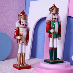 Pair of 30cm sequined wooden nutcracker king figures on a modern display stand