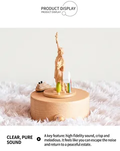 Macro view of wooden Statue of Liberty music box with rotating cruise ship and rainbow detail
