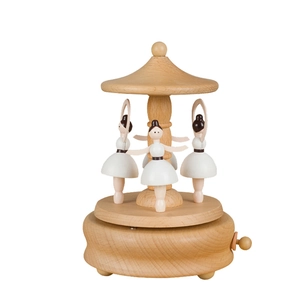 European wooden ballet music box featuring three rotating dancers in white dresses