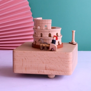 Wooden Roman Colosseum music box with rotating chariot and miniature soldiers