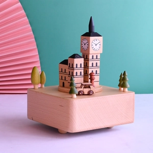 Creative wooden Big Ben music box with a rotating car and green trees on a square base