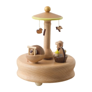 Handcrafted wooden carousel music box with mini cradle and bird ornaments for nursery decor