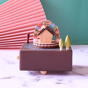 Handcrafted wooden pig music box with Candy House design and rotating mechanical base