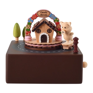 Handcrafted wooden Candy House music box with rotating piglet and miniature trees