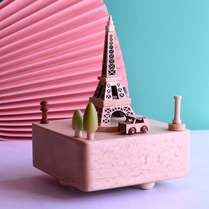 Eiffel Tower wooden music box with moving car and green trees on a square base