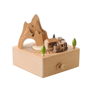 Handcrafted wooden Alishan train music box featuring natural textures and tiny trees