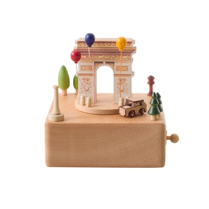 Wooden Arc de Triomphe music box with miniature trees and colorful balloons