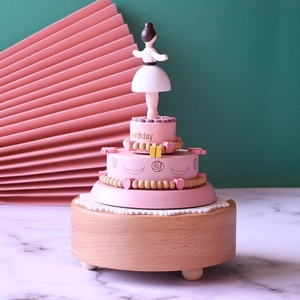 Ballerina girl wooden music box with three-tier pink cake design and Happy Birthday text