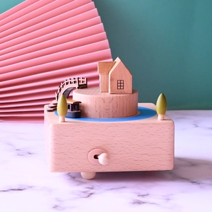 Vintage wooden music box with traditional Chinese bridge and house design in natural wood finish