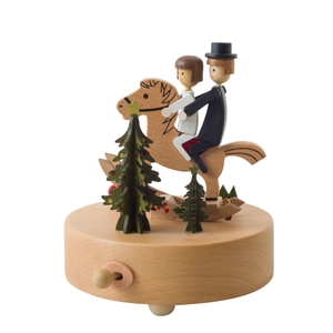 Boîte à musique carrousel romantique avec figurines de mariés sur socle en bois