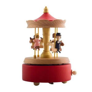 Handcrafted wooden carousel music box with red base and golden accents for gifts