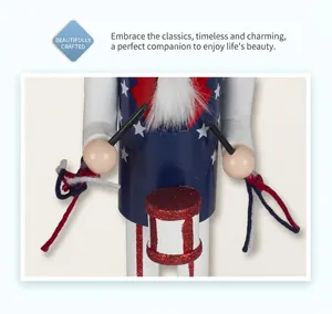 Detail view of wooden nutcracker drummer in US flag colors with drum and drumsticks