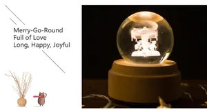 Close-up of 3D laser-engraved carousel crystal ball with warm glowing wooden base