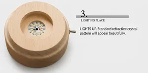 Close-up of a European beech wood glowing base with LED lights for crystal balls