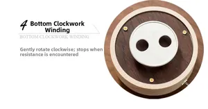 Close-up of the wooden music box base with a mechanical metal clockwork winding mechanism