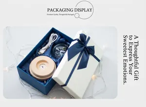 Detailed gift box view containing a glowing crystal ball and beech wood LED base with USB cable
