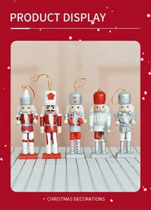 Detailed view of five 13cm wooden nutcracker ornaments with festive glitter accents