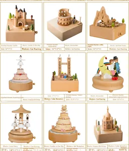 Grid view of various handmade wooden music boxes featuring world landmarks and romantic scenes