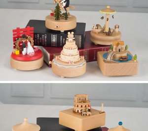Detailed macro shot of handcrafted wooden music boxes with various miniature theme designs