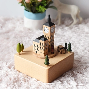 Handcrafted wooden music box featuring London Big Ben architectural design on base