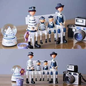Mediterranean nautical sailor doll family set with blue stripes and wooden bench decor