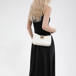 Minimalist white leather underarm bag for women with elegant gold square metal buckle clasp
