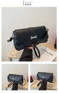 Detail of black underarm bag with geometric chain print and silver metal buckle