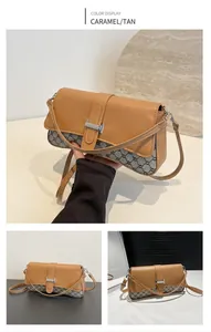Close-up of khaki leather flap bag featuring contrast canvas and silver H-buckle detail