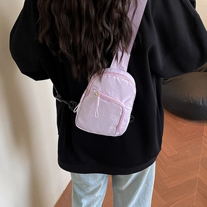 Lightweight purple mini crossbody chest bag made of textured nylon for casual outdoor sports