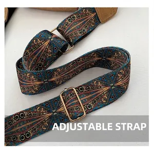 Detailed close-up of bohemian jacquard strap with adjustable golden metal buckle hardware