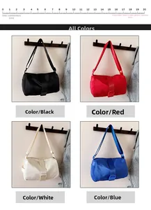 Detail of minimalist nylon pillow bags in black, red, white, and blue with wide straps