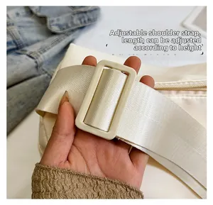 Detail shot of the adjustable wide nylon shoulder strap with durable rectangle buckle